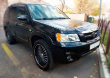 Реснички на фары для Mazda Tribute 2000-2006 (EP)
