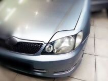 Реснички на фары для Toyota Corolla NZE 121 2000-2005 (седан)