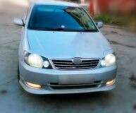Реснички на фары для Toyota Corolla NZE 121 2000-2005 (седан)
