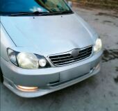 Реснички на фары для Toyota Corolla NZE 121 2000-2005 (седан)