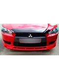 Вставка между "клыками" Mitsubishi Lancer 10 Дорестайлинг 2007-2010