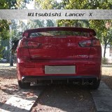Накладка на задний бампер диффузор ПОД ОДНУ ТРУБУ Mitsubishi Lancer 10 (2007-2015)