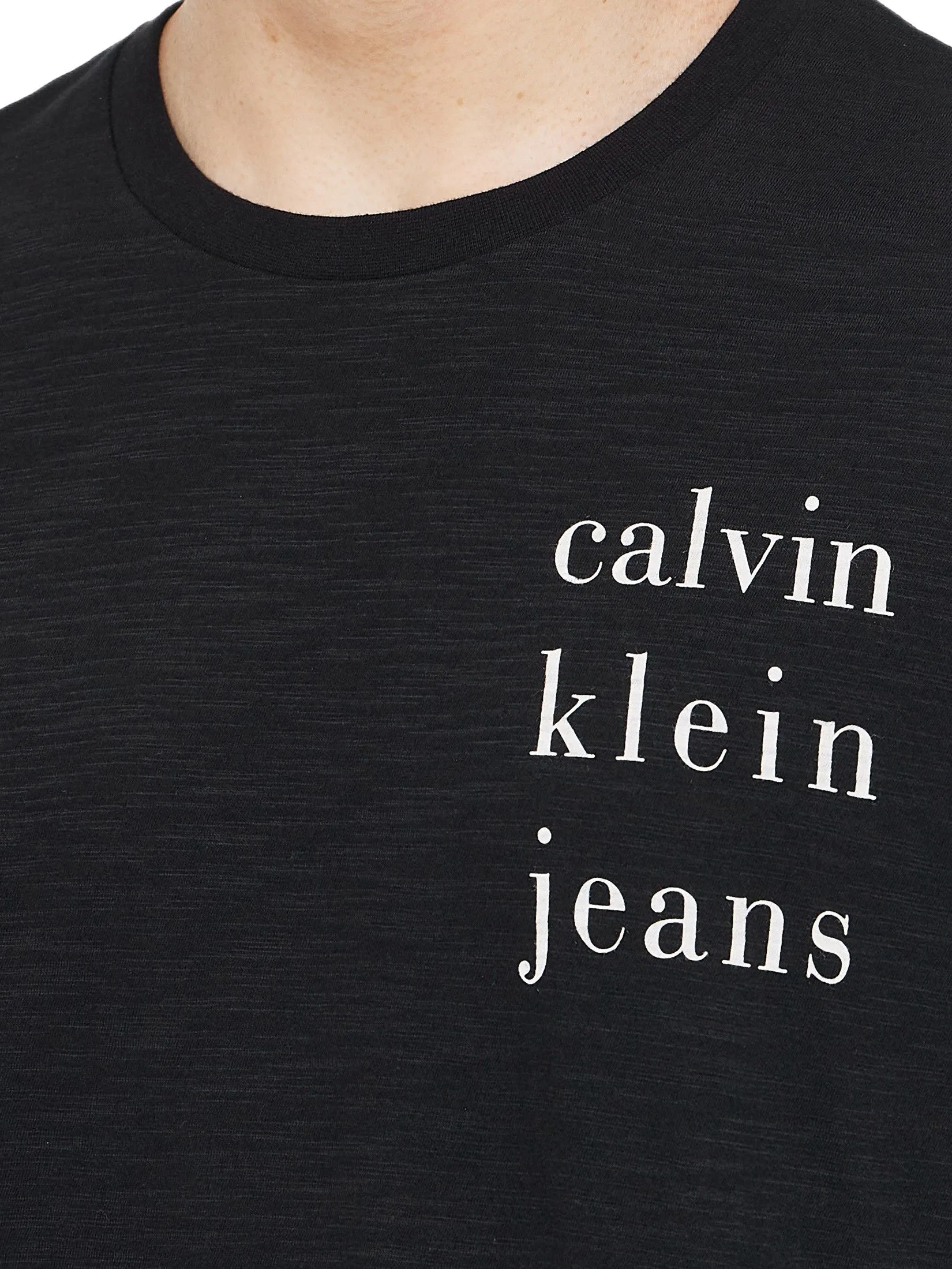 CALVIN KLEIN Men's Spaced Logo Graphic Regular Short Sleeve T-Shirt Black CALVIN KLEIN Men's Spaced Logo Graphic Regular Short Sleeve T-Shirt Black