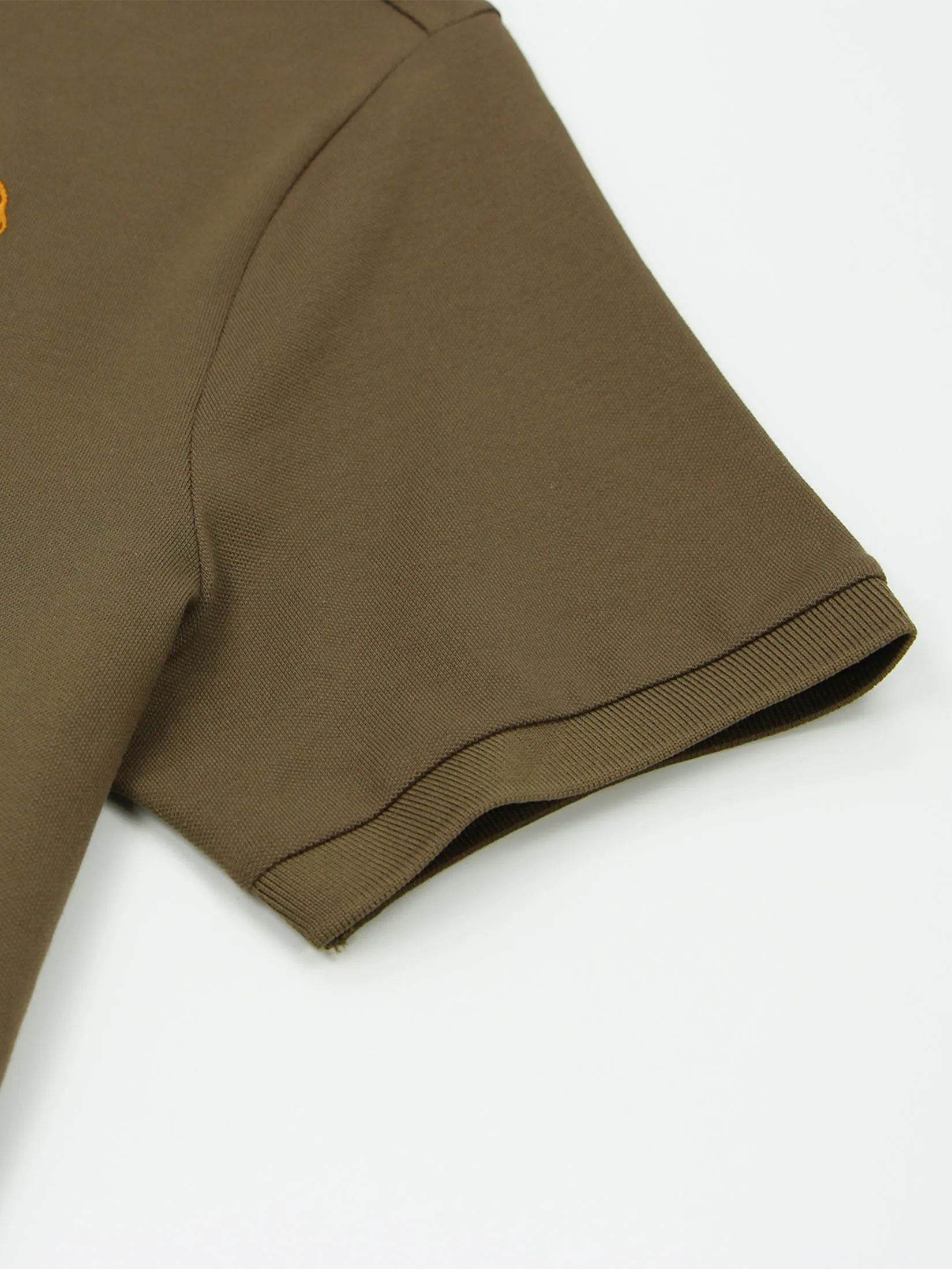 GIORDANO Men s Slim Embroidery Bold Polo (3D Lion) Brown Olive GIORDANO Men s Slim Embroidery Bold Polo (3D Lion) Brown Olive