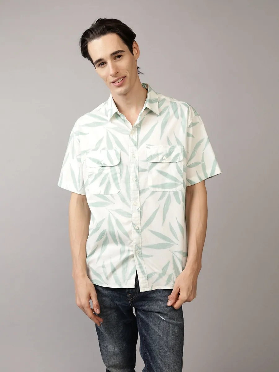 American Eagle MEN PALMER LEAVES SS OVERSIZED CSC 32S POPLIN REVERSE PRINT 333 JADE American Eagle MEN PALMER LEAVES SS OVERSIZED CSC 32S POPLIN REVERSE PRINT 333 JADE