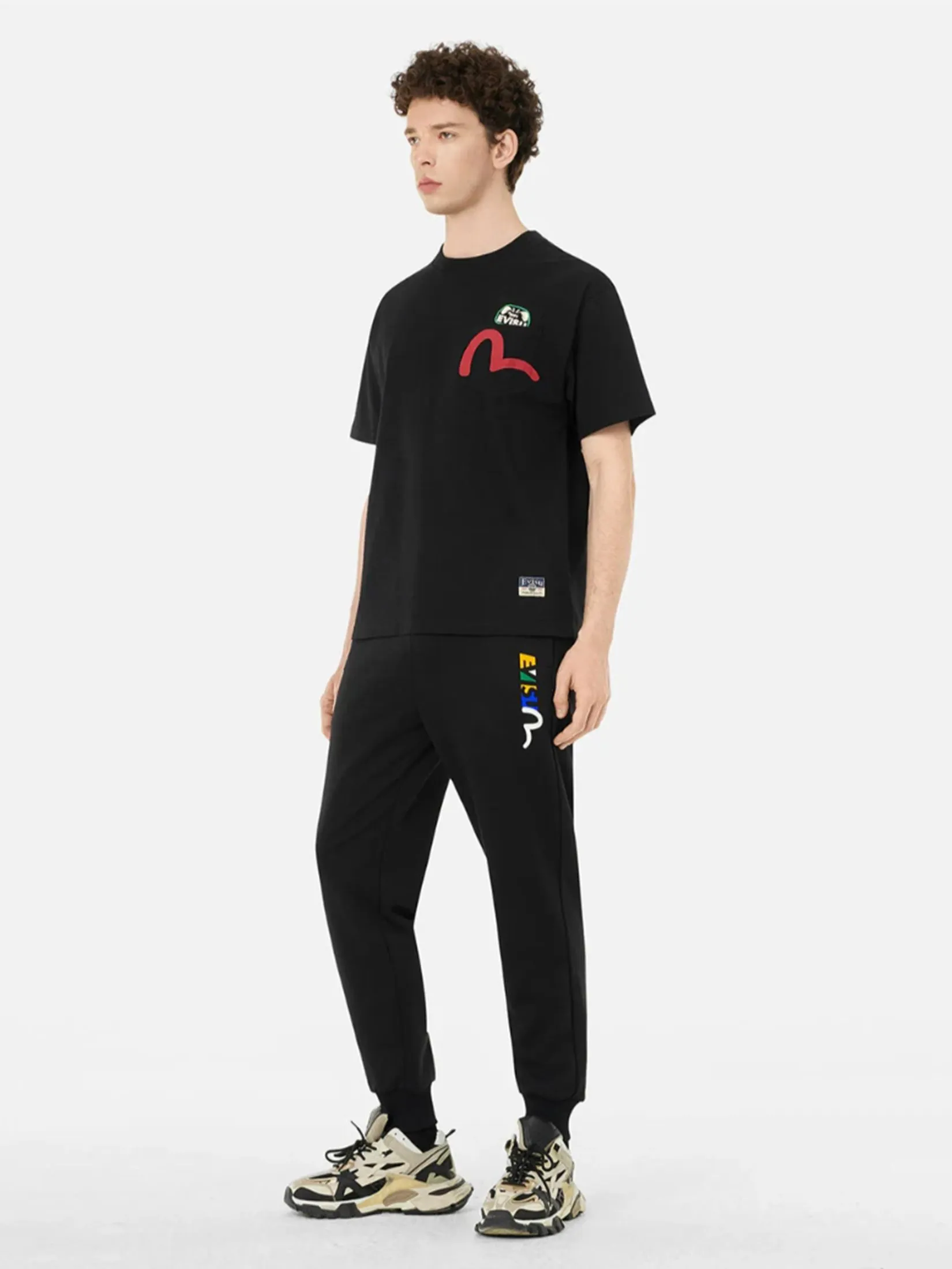 EVISU Men T-Shirt Multi-Pocket and Multi-Print Detail Relax Fit EVISU Men T-Shirt Multi-Pocket and Multi-Print Detail Relax Fit