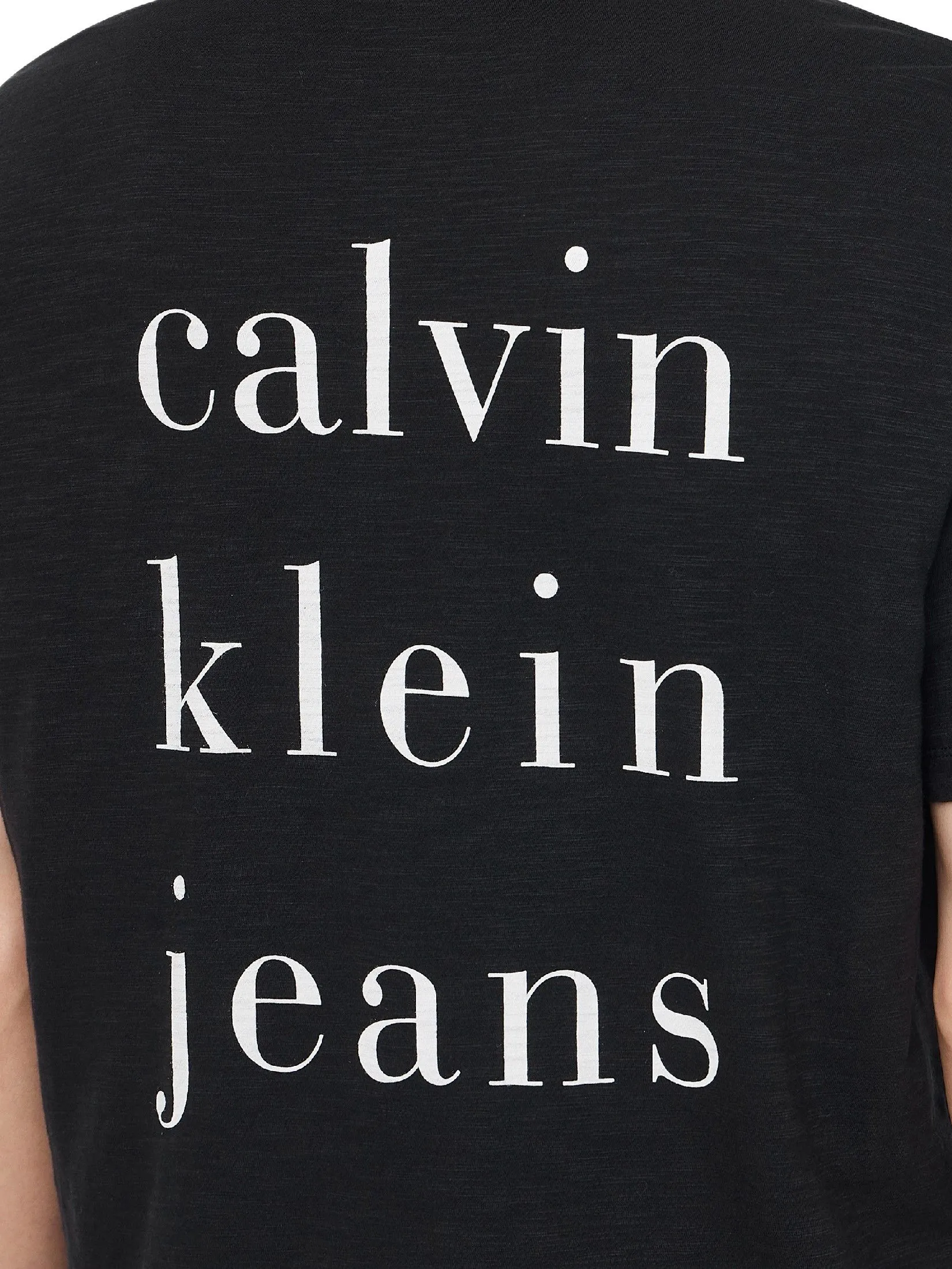 CALVIN KLEIN Men's Spaced Logo Graphic Regular Short Sleeve T-Shirt Black CALVIN KLEIN Men's Spaced Logo Graphic Regular Short Sleeve T-Shirt Black