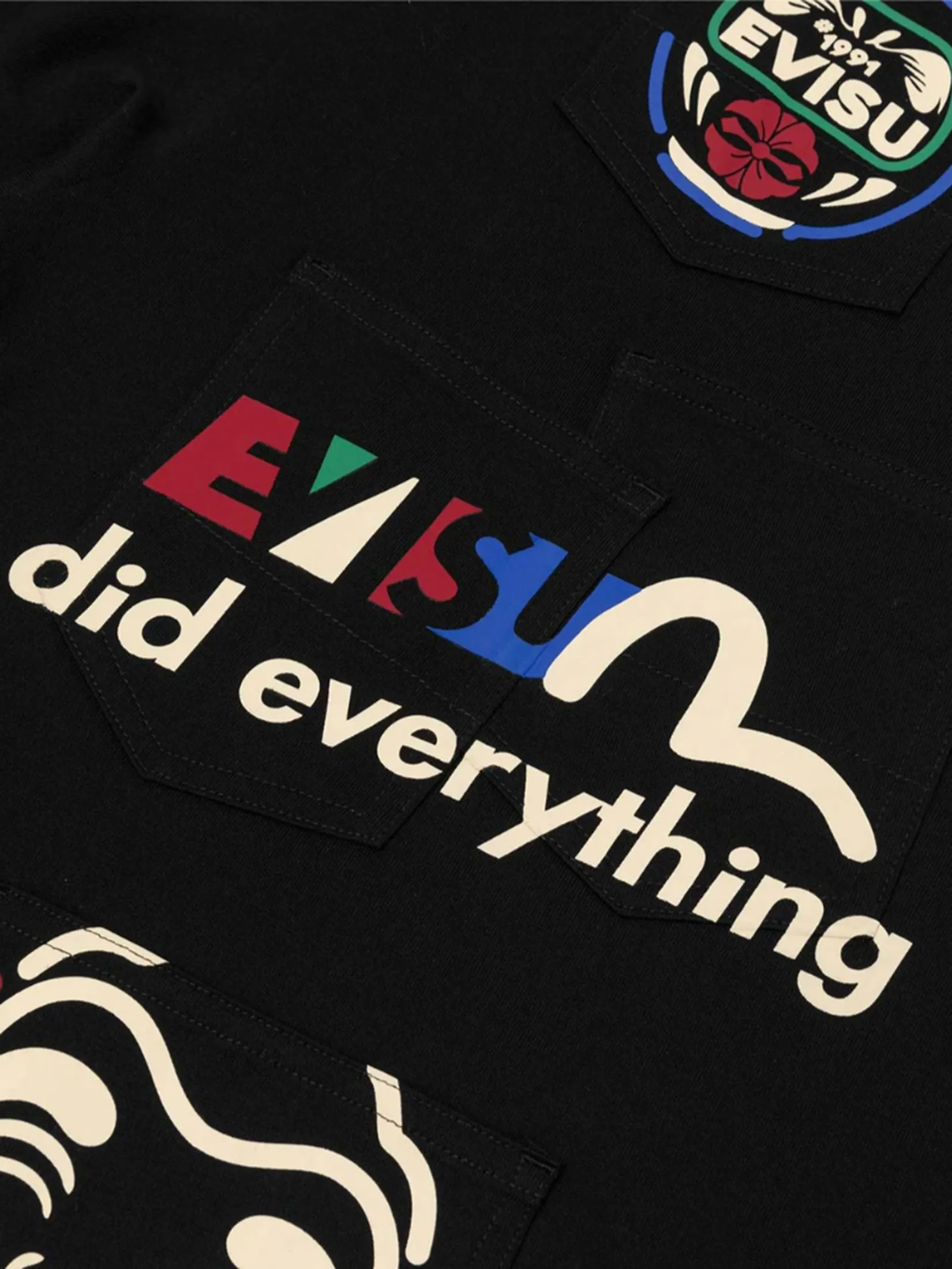 EVISU Men T-Shirt Multi-Pocket and Multi-Print Detail Relax Fit EVISU Men T-Shirt Multi-Pocket and Multi-Print Detail Relax Fit