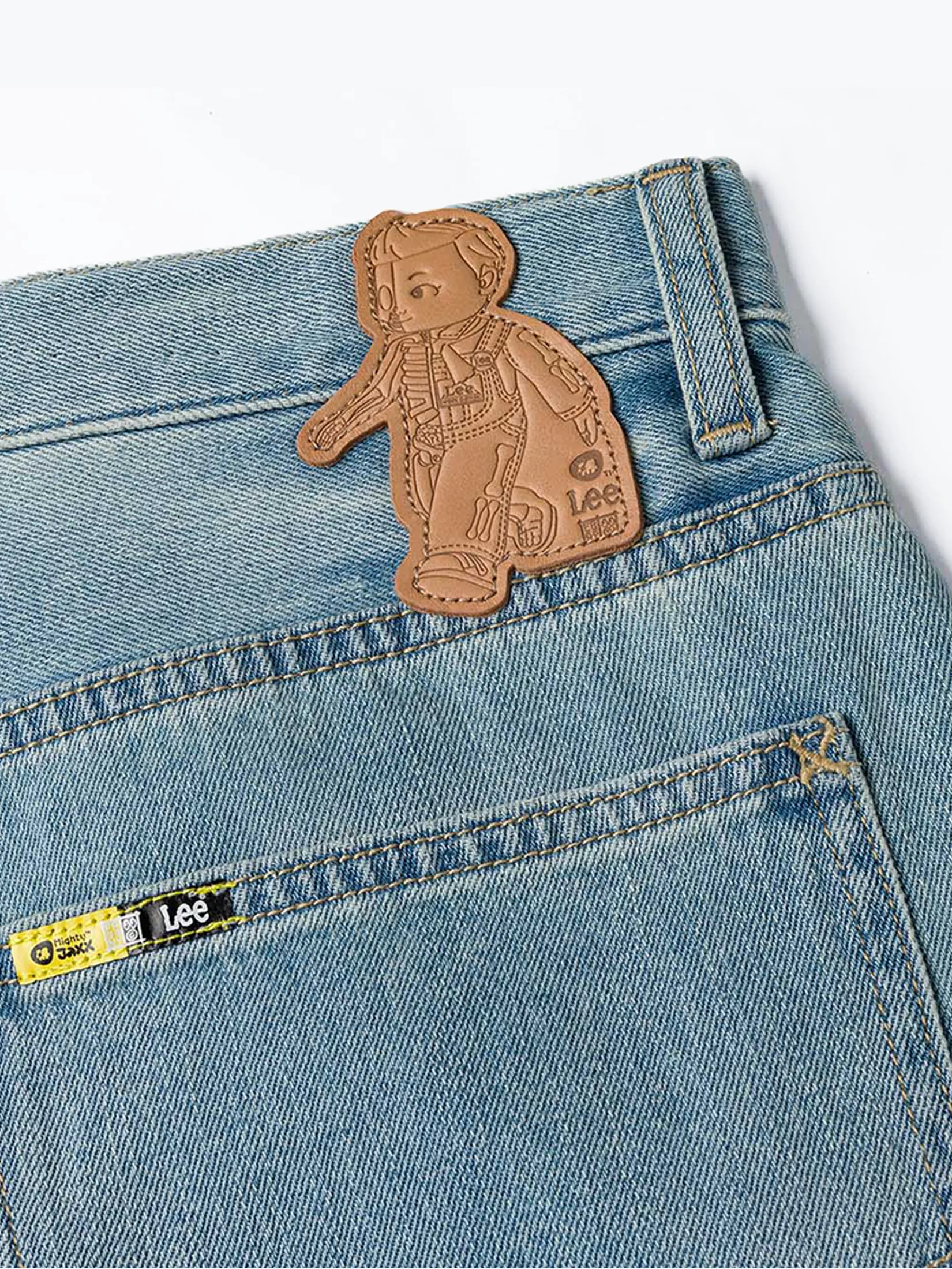 LEE Men s Jeans Lee x Mighty Jaxx Collection Mid Comfort Fit Light Indigo