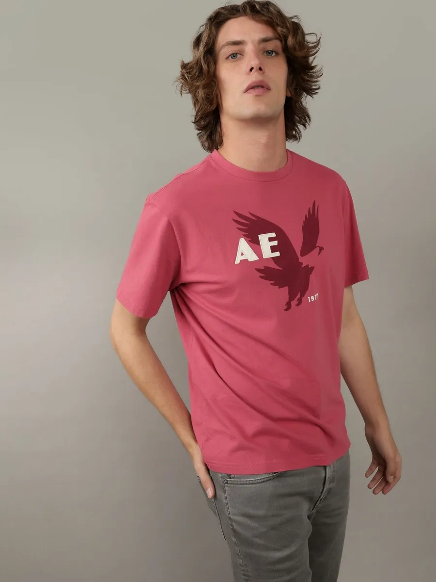 AMERICAN EAGLE MEN G SS SUM 2 OMNI SET IN TEE- PC DYE + SERIOUSLY SOFT WASH 600 RED