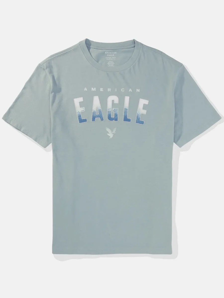 AMERICAN EAGLE MEN G SS INTL ELEVATED SET IN TEE- PC DYE + SERIOUSLY SOFT WASH 401 LIGHT BLUE