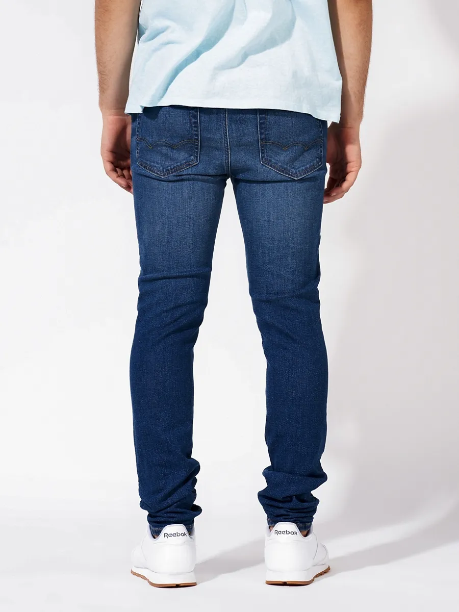 AMERICAN EAGLE MEN INTL EXCLUSIVE DARK CLEAN SKINNY FIT 936 MEDIUM WASH