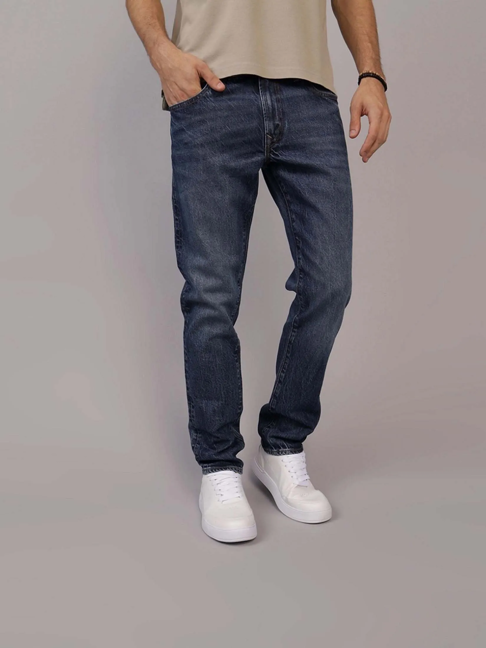 AMERICAN EAGLE MEN INTL EXCLUSIVE MEDIUM CLEAN SLIM 489 MEDIUM VINTAGE WASH