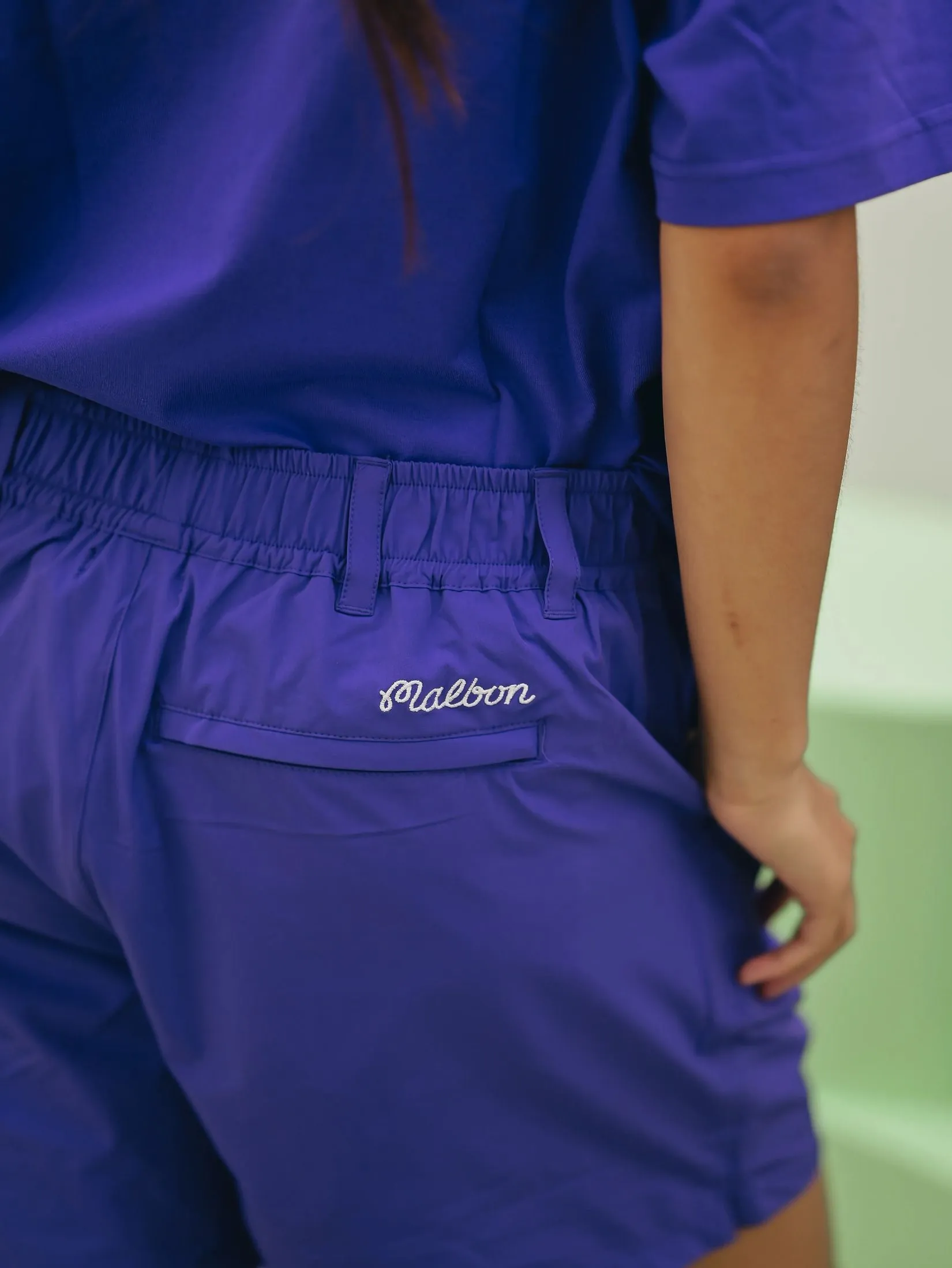 MALBON GOLF WIZ SHORTS IN PURPLE