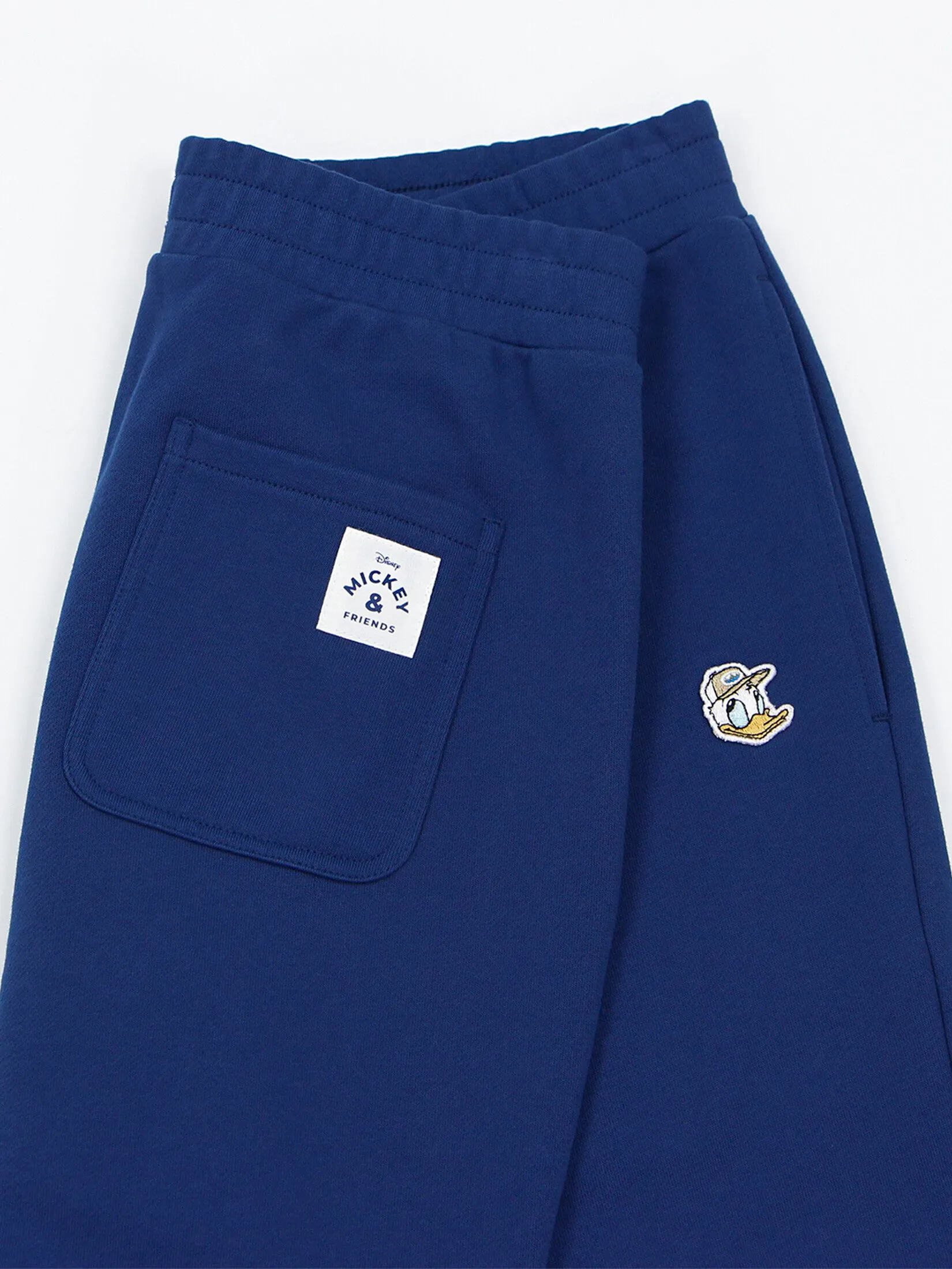 GIORDANO Men's French Terry Elastic Waist Knit Pants (Disney) Blue