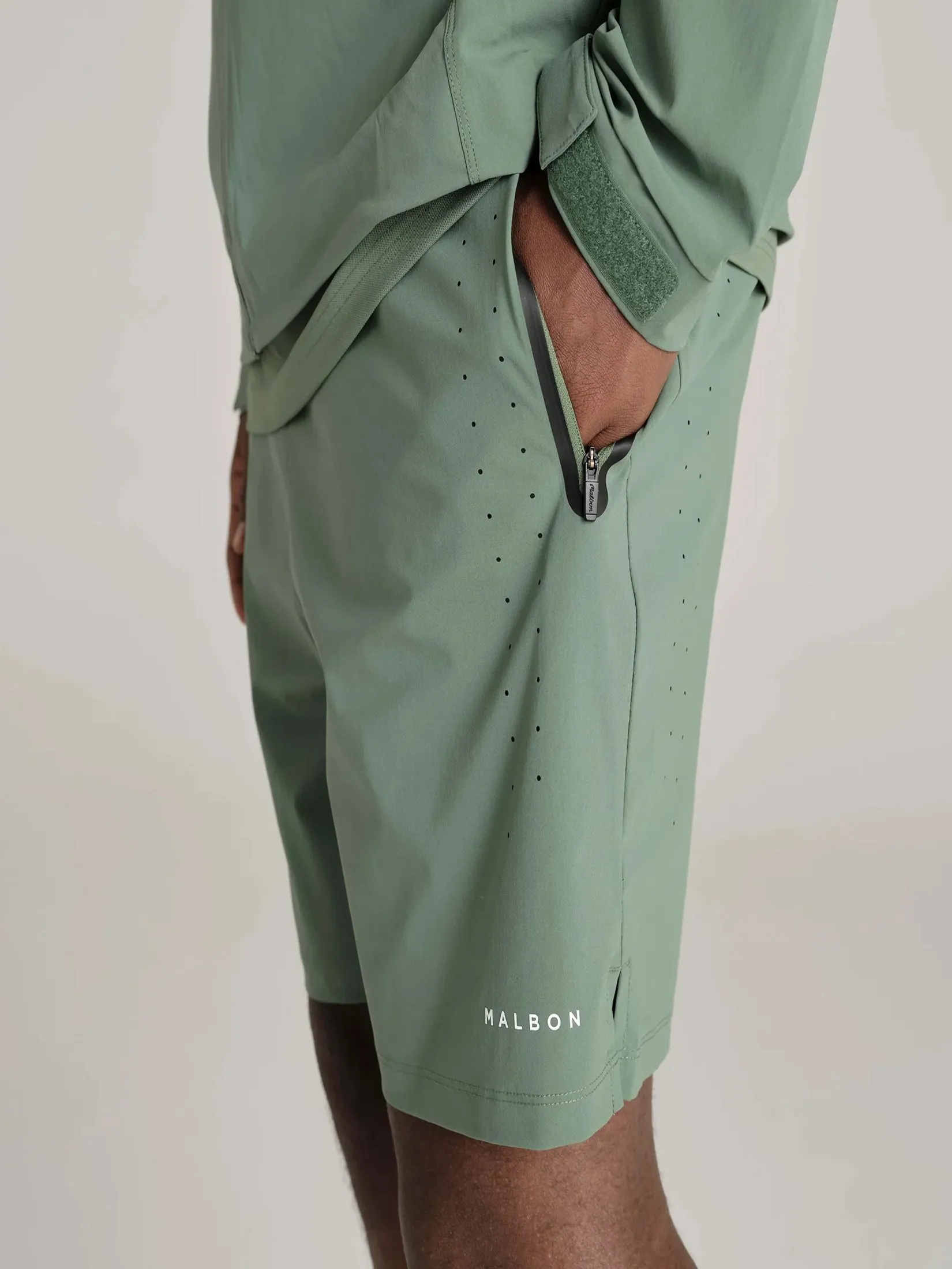MALBON GOLF PERFORMANCE 2-1 SHORTS IN GREEN