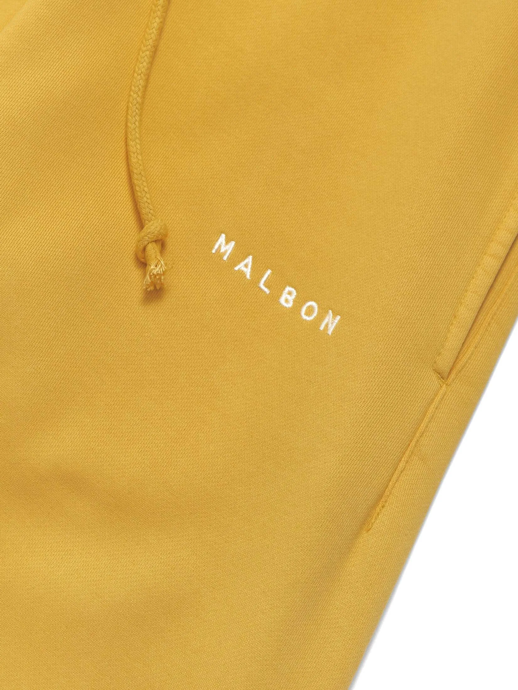 MALBON GOLF KNOLL SWEATPANT IN YELLOW