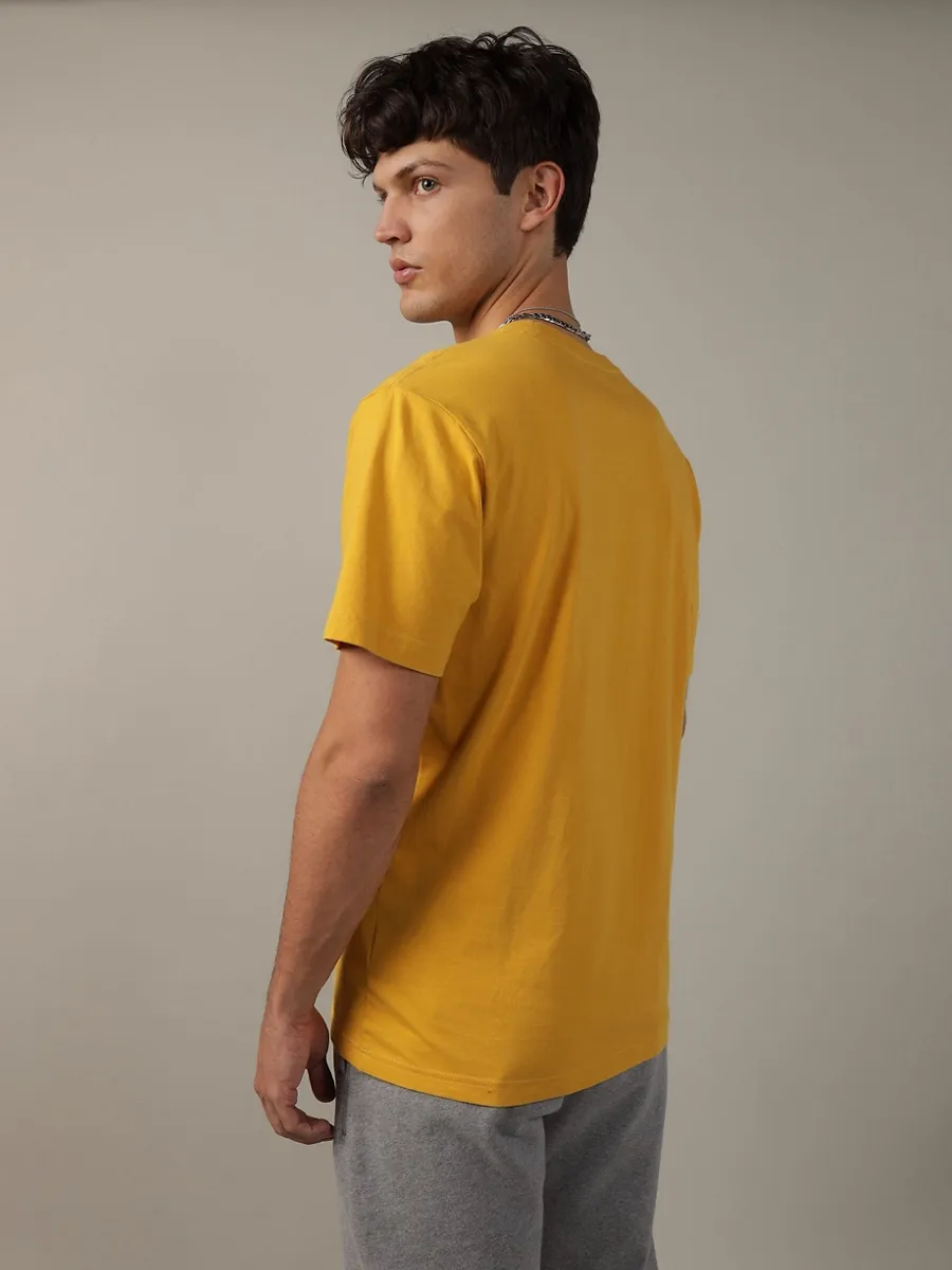AMERICAN EAGLE MEN G SS CORE BRAND SET IN TEE- PC DYE + SERIOUSLY SOFT WASH 709 GOLD