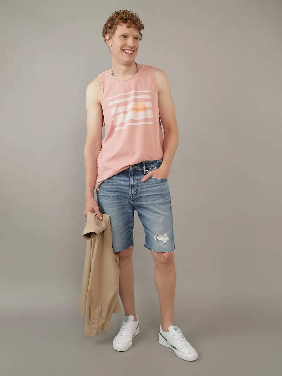 AMERICAN EAGLE MEN MEDIUM W/ DESTROY BAGGY JEAN SHORT - CUT & CUFF 936 MEDIUM WASH Size - 28 EU