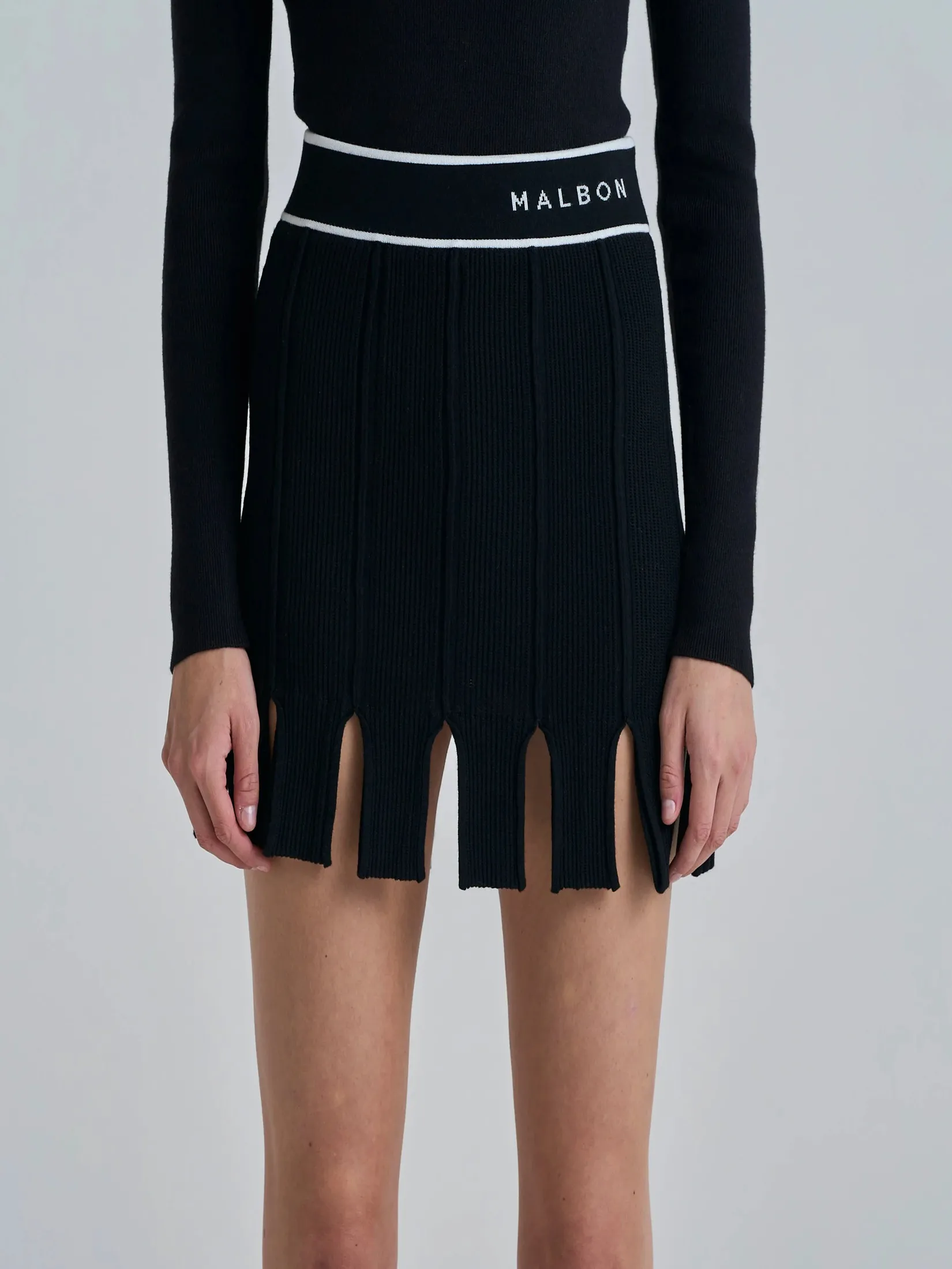 MALBON GOLF HONOR SKIRT IN BLACK