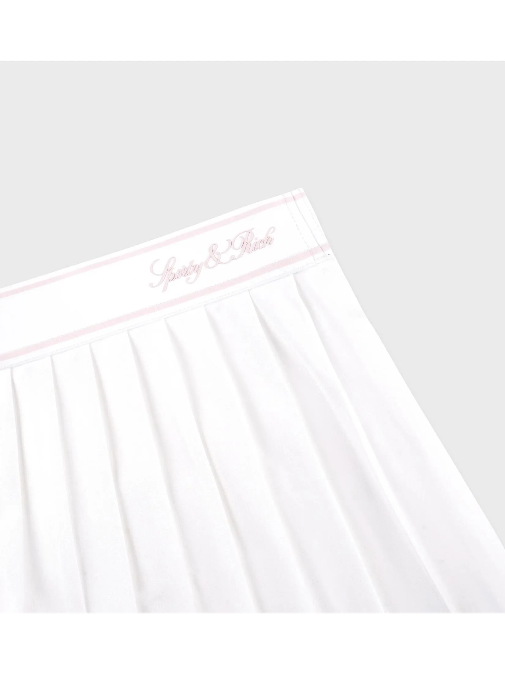 SPORTY & RICH Women Pleated Skirt Vendome Script - White/Pink Dolphin