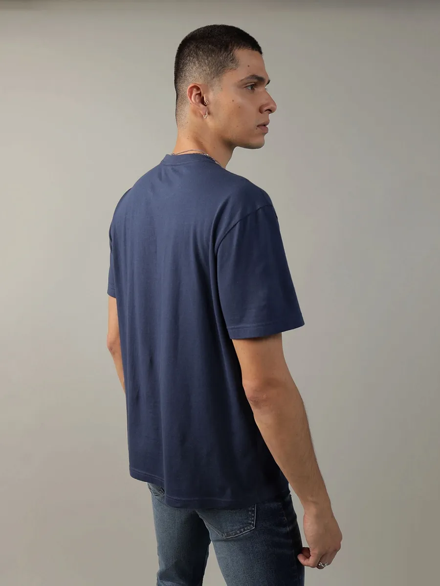 AMERICAN EAGLE MEN G SS INTL ELEVATED SET IN TEE- PC DYE + SERIOUSLY SOFT WASH 451 DARK BLUE
