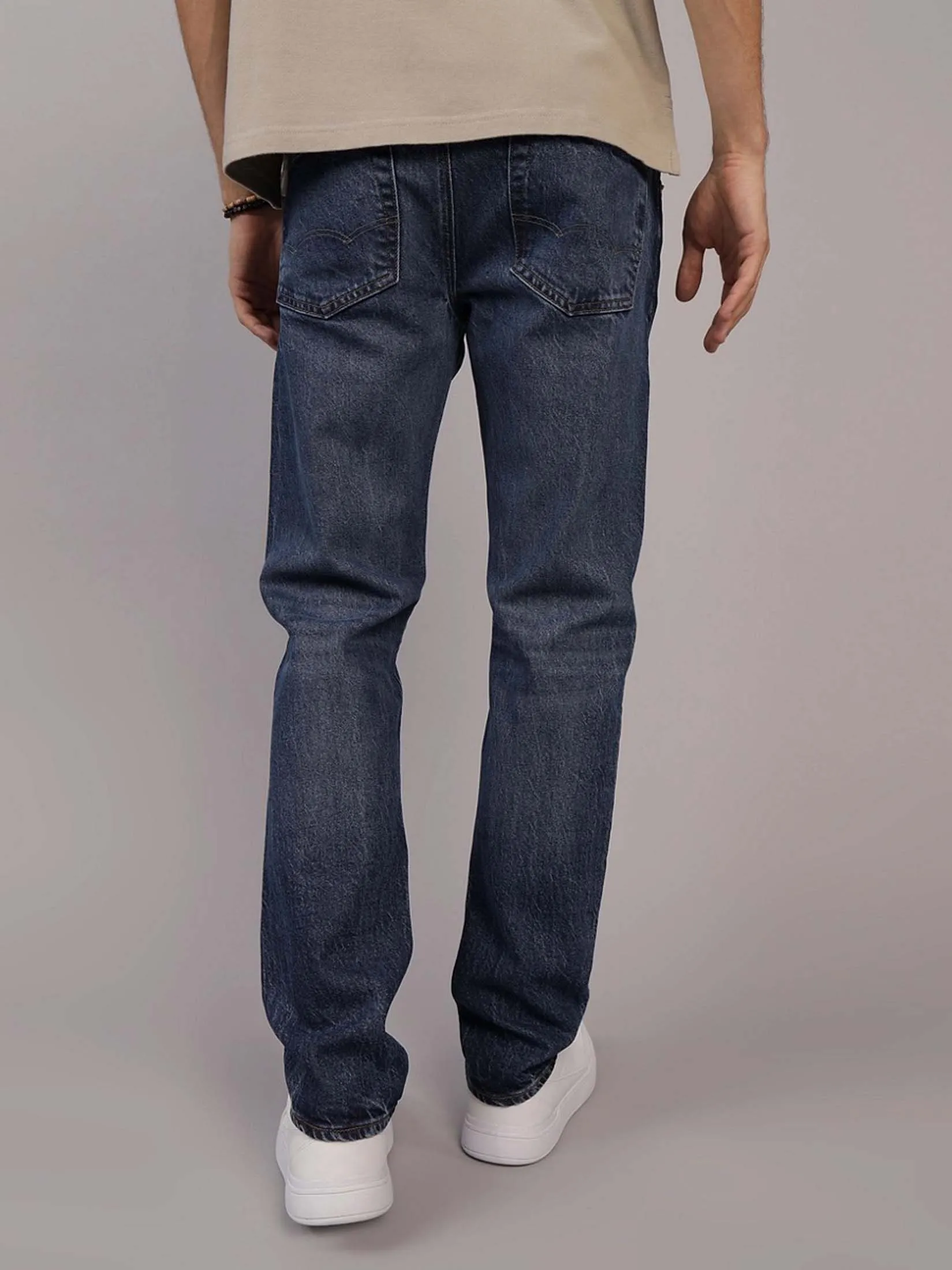 AMERICAN EAGLE MEN INTL EXCLUSIVE MEDIUM CLEAN SLIM 489 MEDIUM VINTAGE WASH