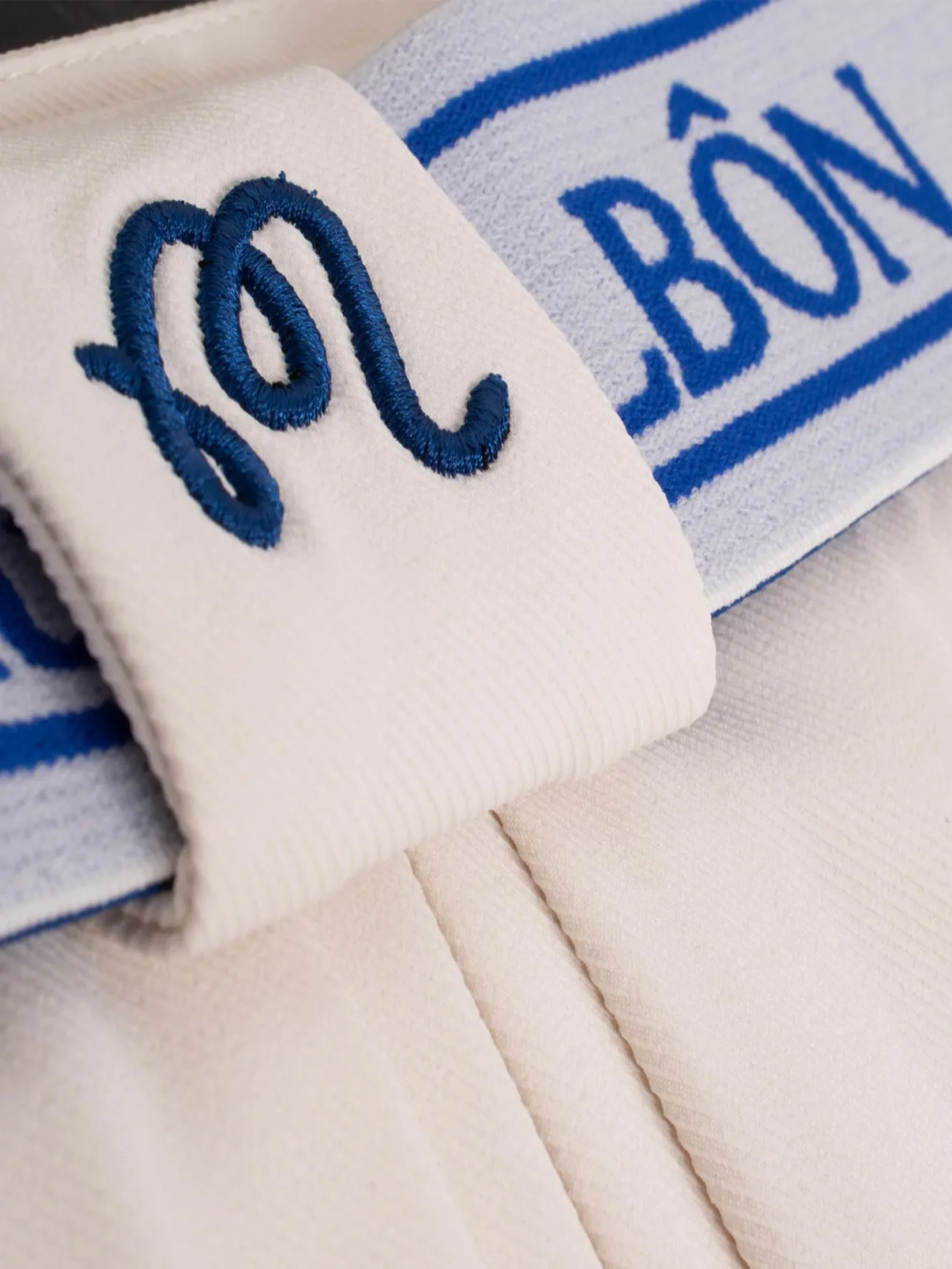 MALBON GOLF JOELLE PLEATED SKIRT IN IVORY