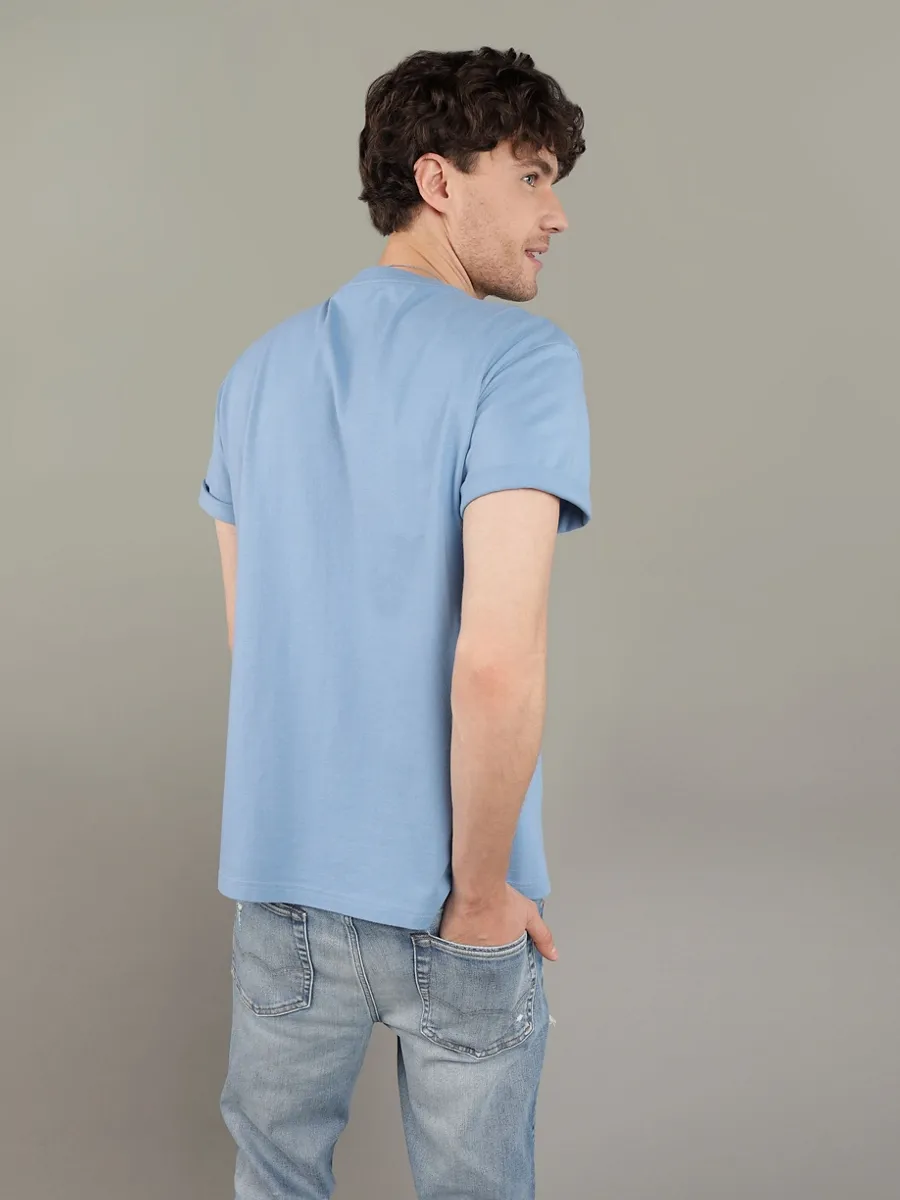 AMERICAN EAGLE MEN G SS PHOTOREAL SET IN TEE- PC DYE + MAGIC WHITE TUMBLE 415 TIDAL BLUE