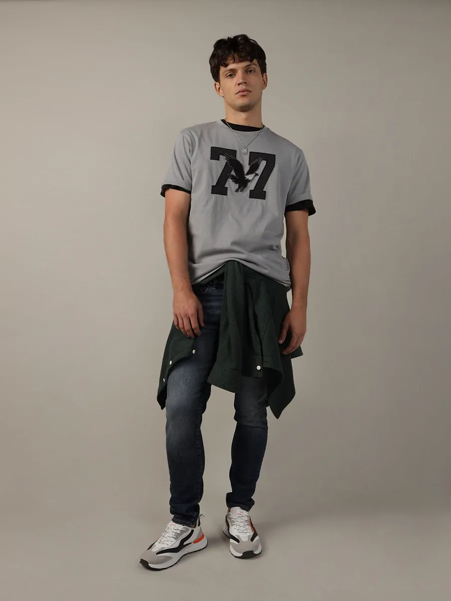 AMERICAN EAGLE MEN G SS INTL SET IN TEE - PC DYE + MAGIC WHITE TUMBLE 050 GREY