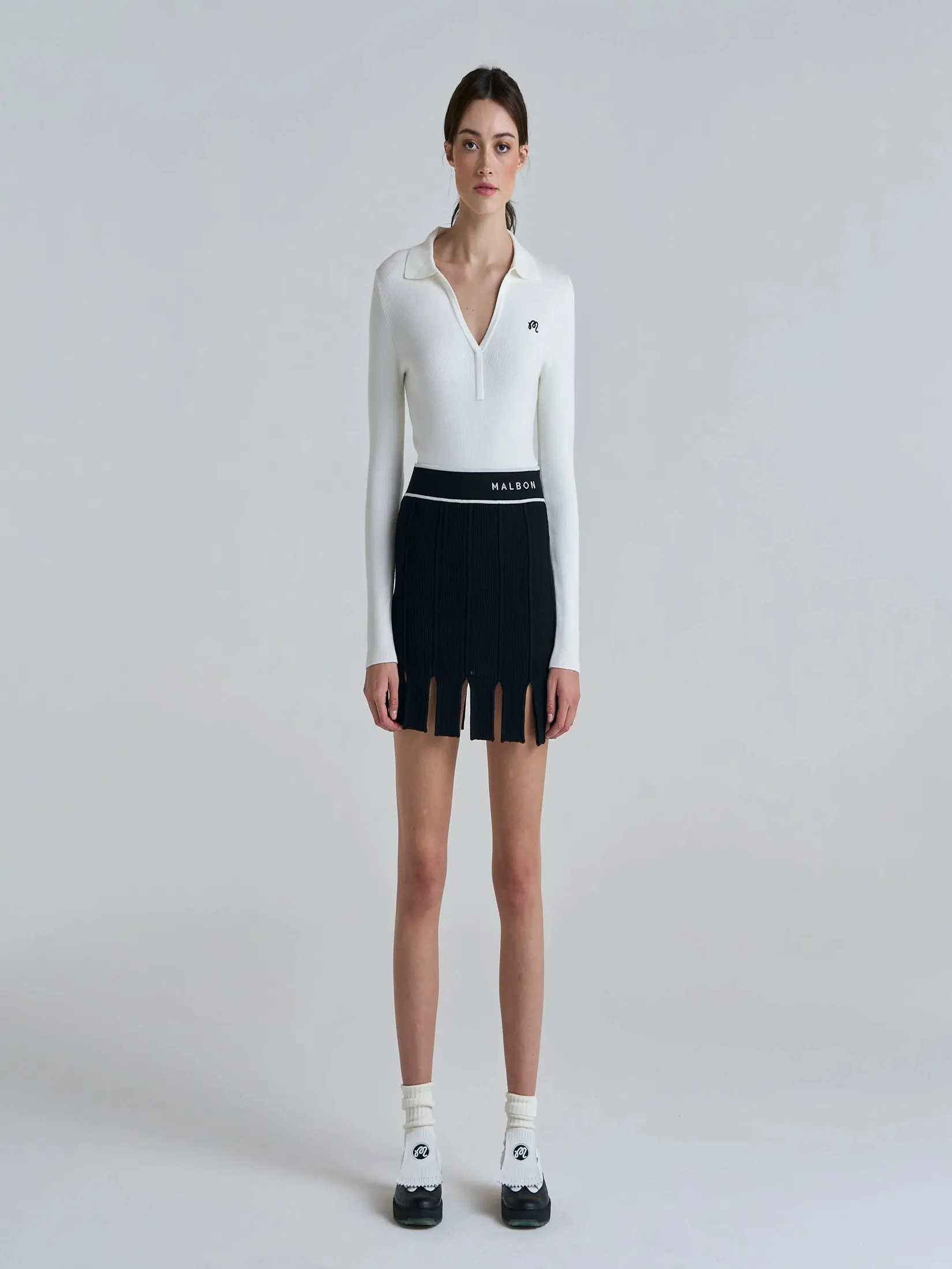 MALBON GOLF HONOR SKIRT IN BLACK