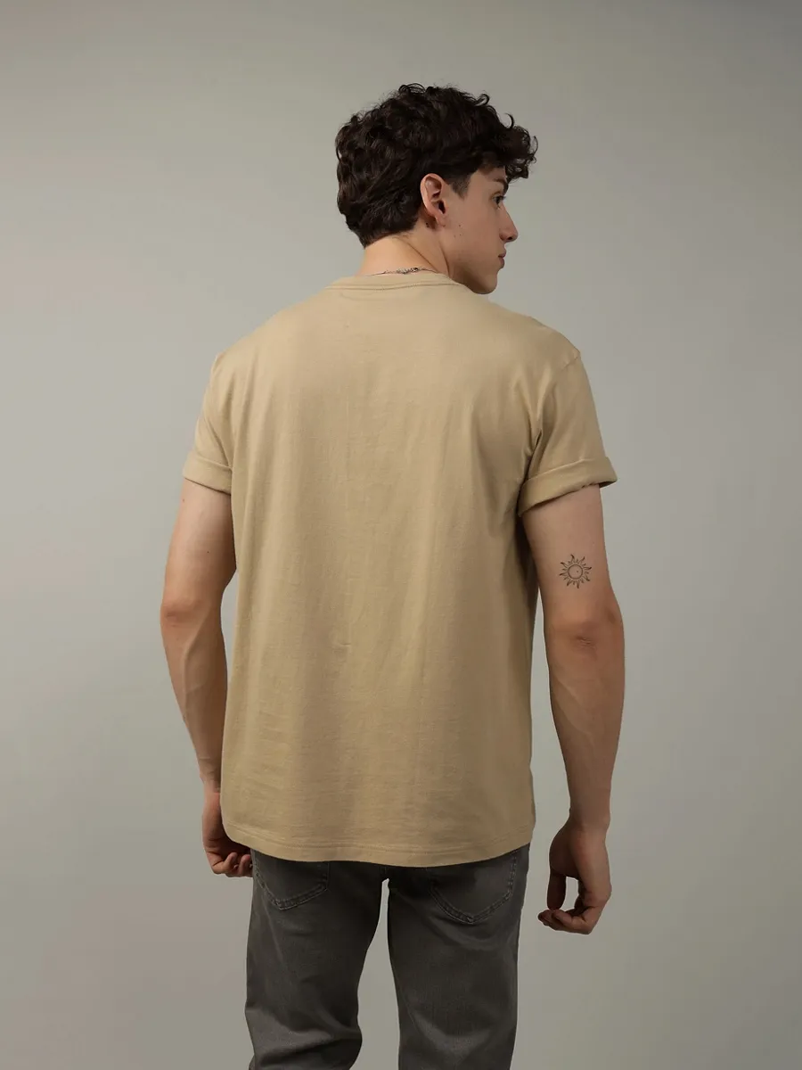 AMERICAN EAGLE MEN G SS INTL ELEVATED SET IN TEE- PC DYE + SERIOUSLY SOFT WASH 212 KHAKI