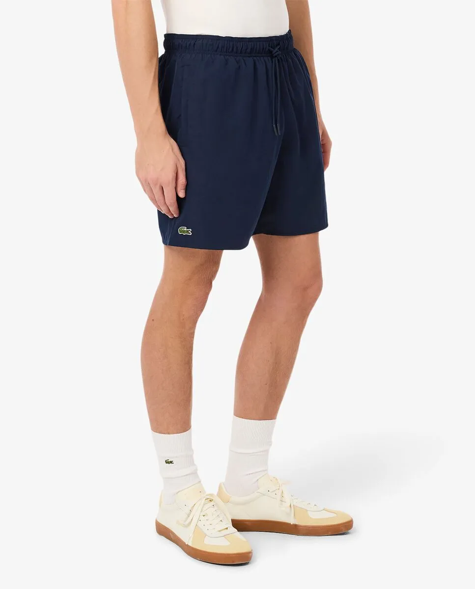 LACOSTE Mid Length Monochrome Swim Trunks Blue
