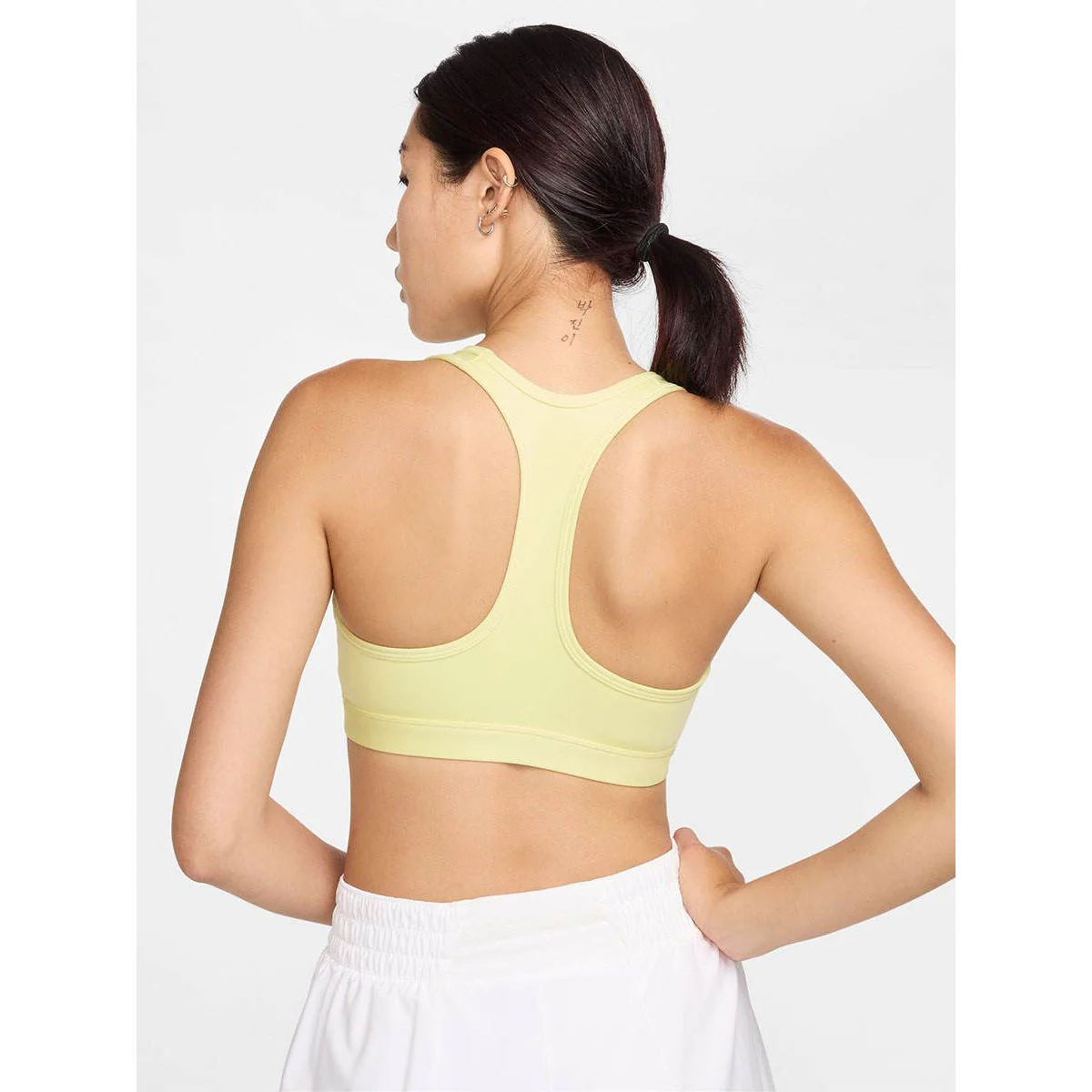 Женский спортивный топ Nike Swoosh Medium Support — цвет желтый, размер L (американский размер)